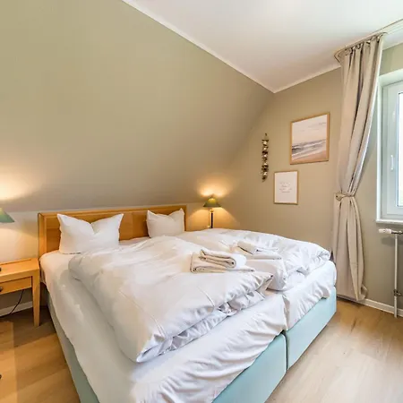 Hus Inselkieker 217 Апартаменты Шиллиг